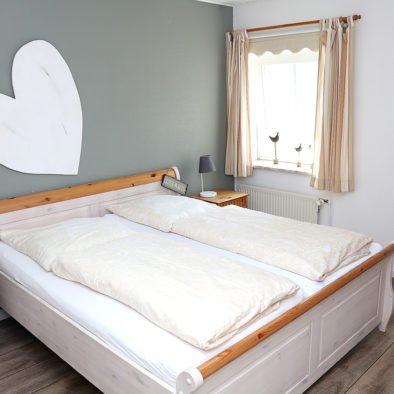 Schlafzimmer in der Ferienwohnung Achtern Diek