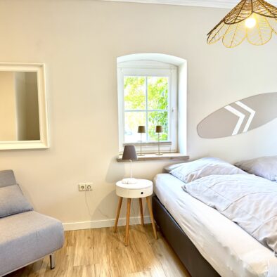Schlafzimmer der Ferienwohnung Bett in't Kornfeld
